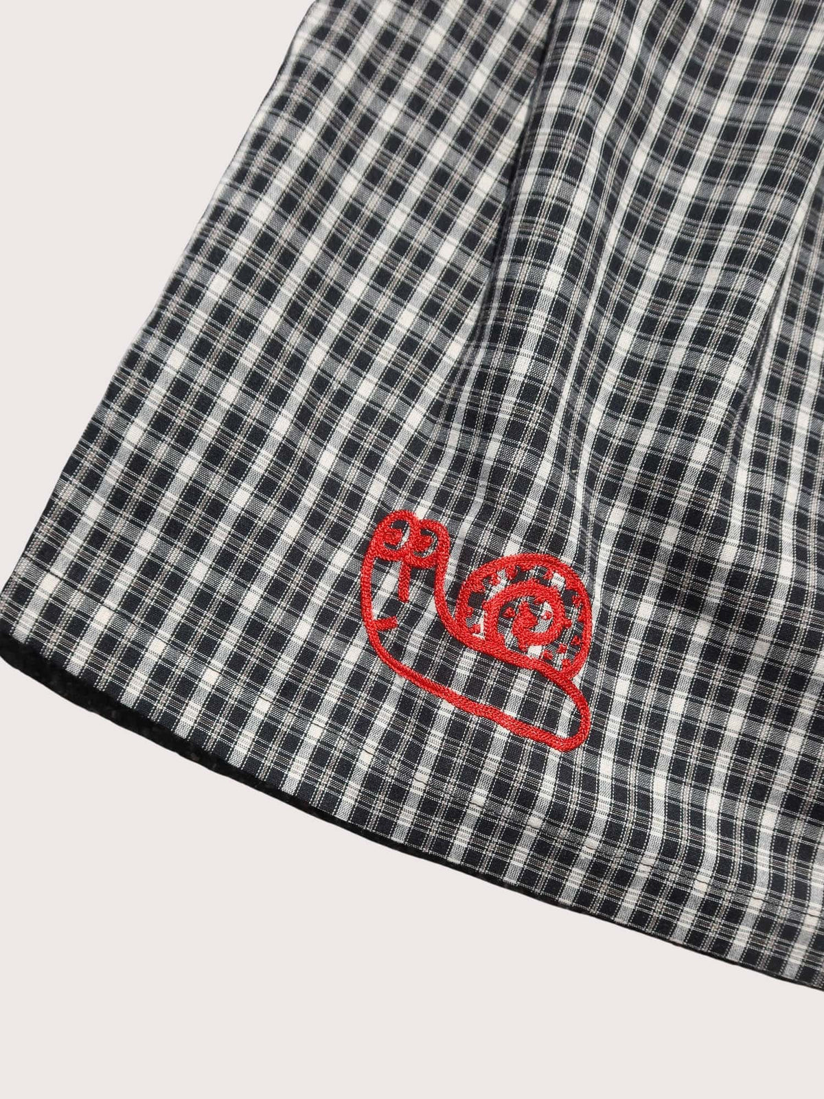 Checked Out Black Skirt