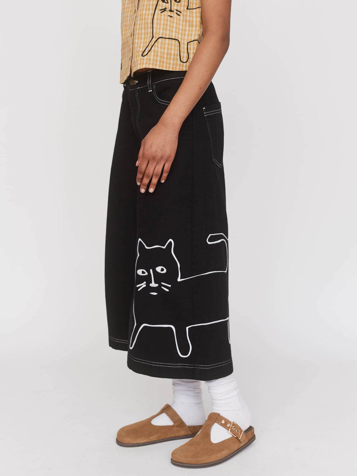 model:Kerethika wears size 8 and is 5’ 7”
