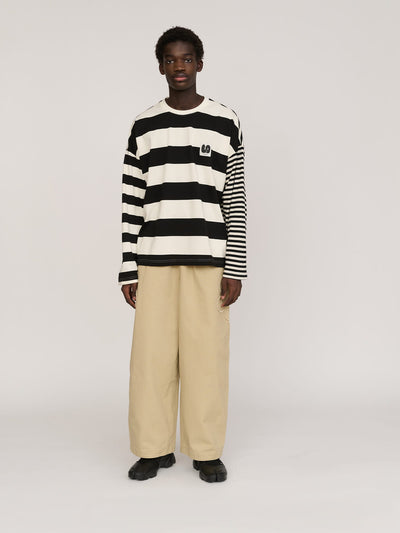 model:Elhadj wears size L and is 6’1”