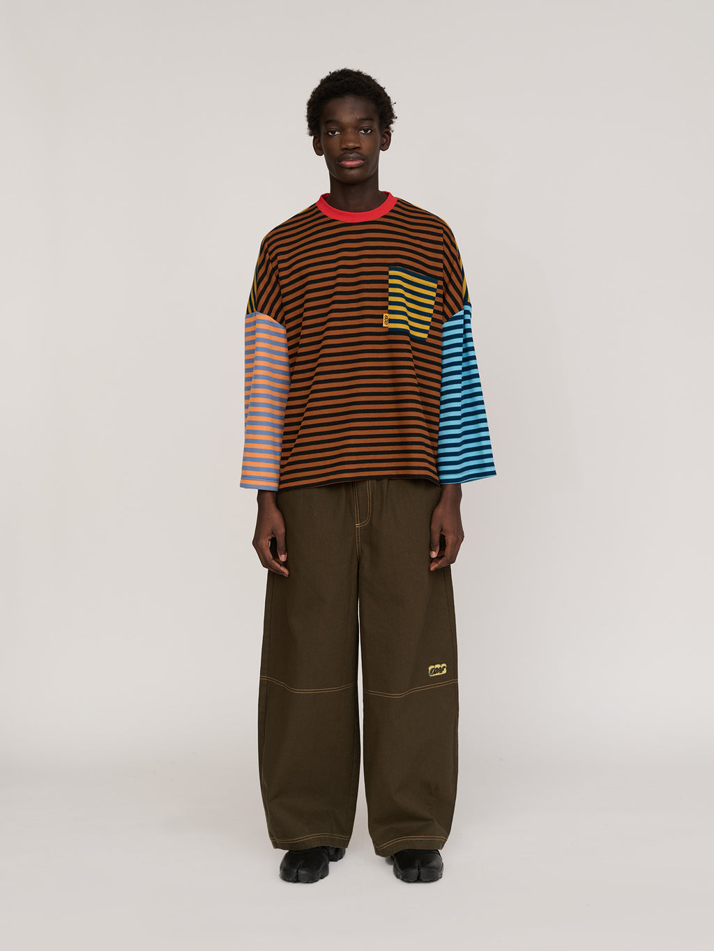 model:Elhadj wears size S and is 6’1”