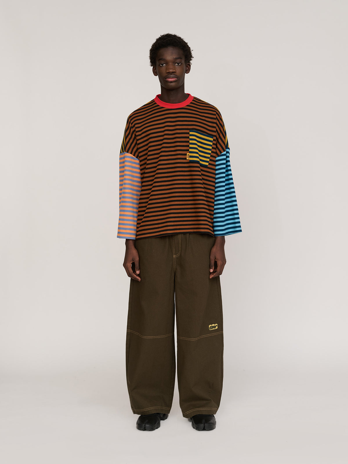 model:Elhadj wears size XS-L and is 6’1”