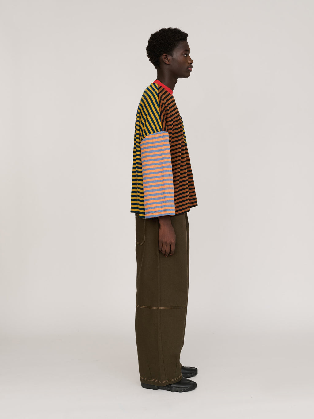 model:Elhadj wears size S and is 6’1”