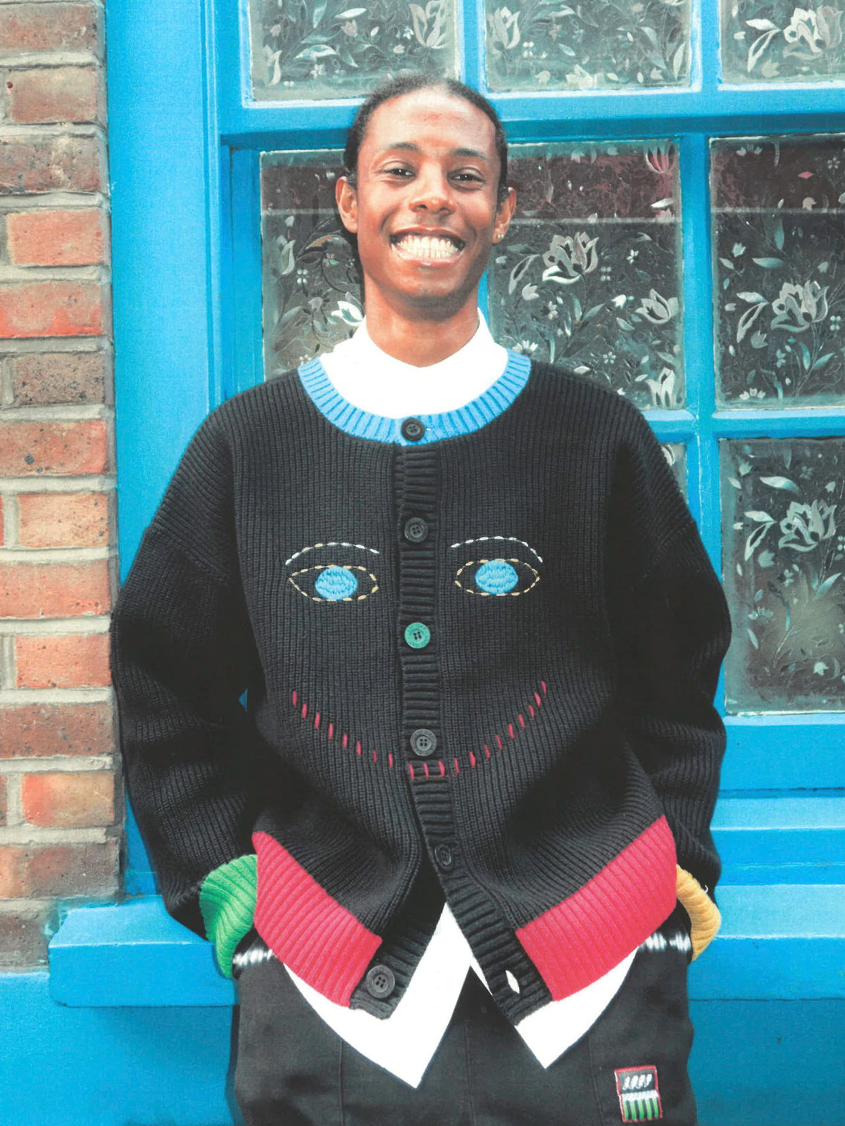 Picture of male model in Wrong Way Round Reversible Knit Cardigan