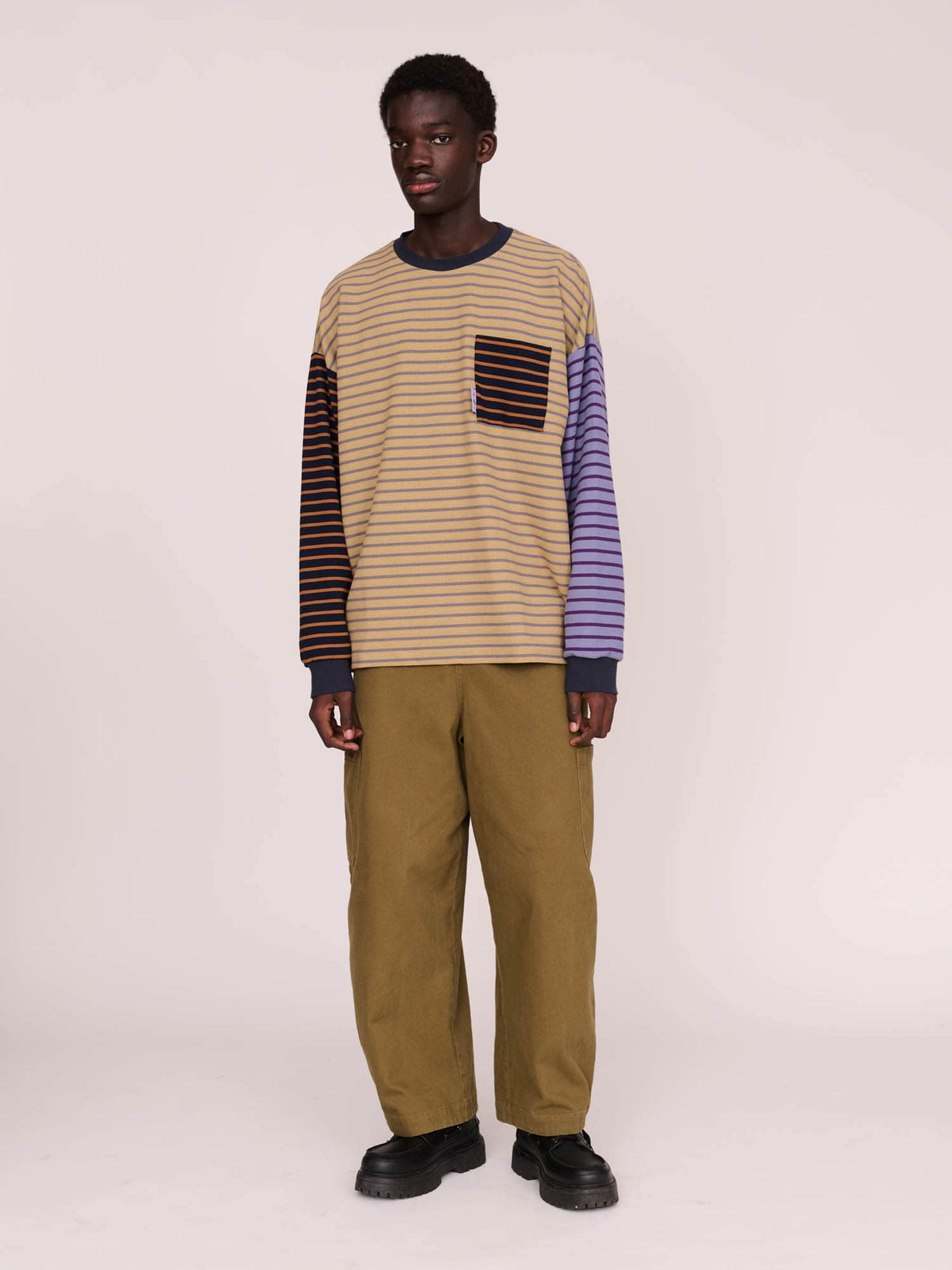 model:Elhadj wears size L and is 6’1”