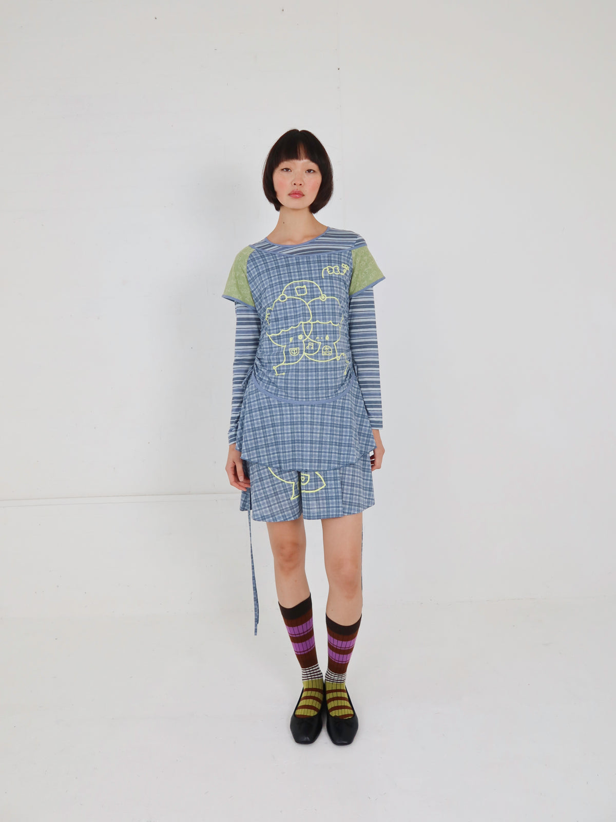model: Nomin wears size 8 and is 5’10”