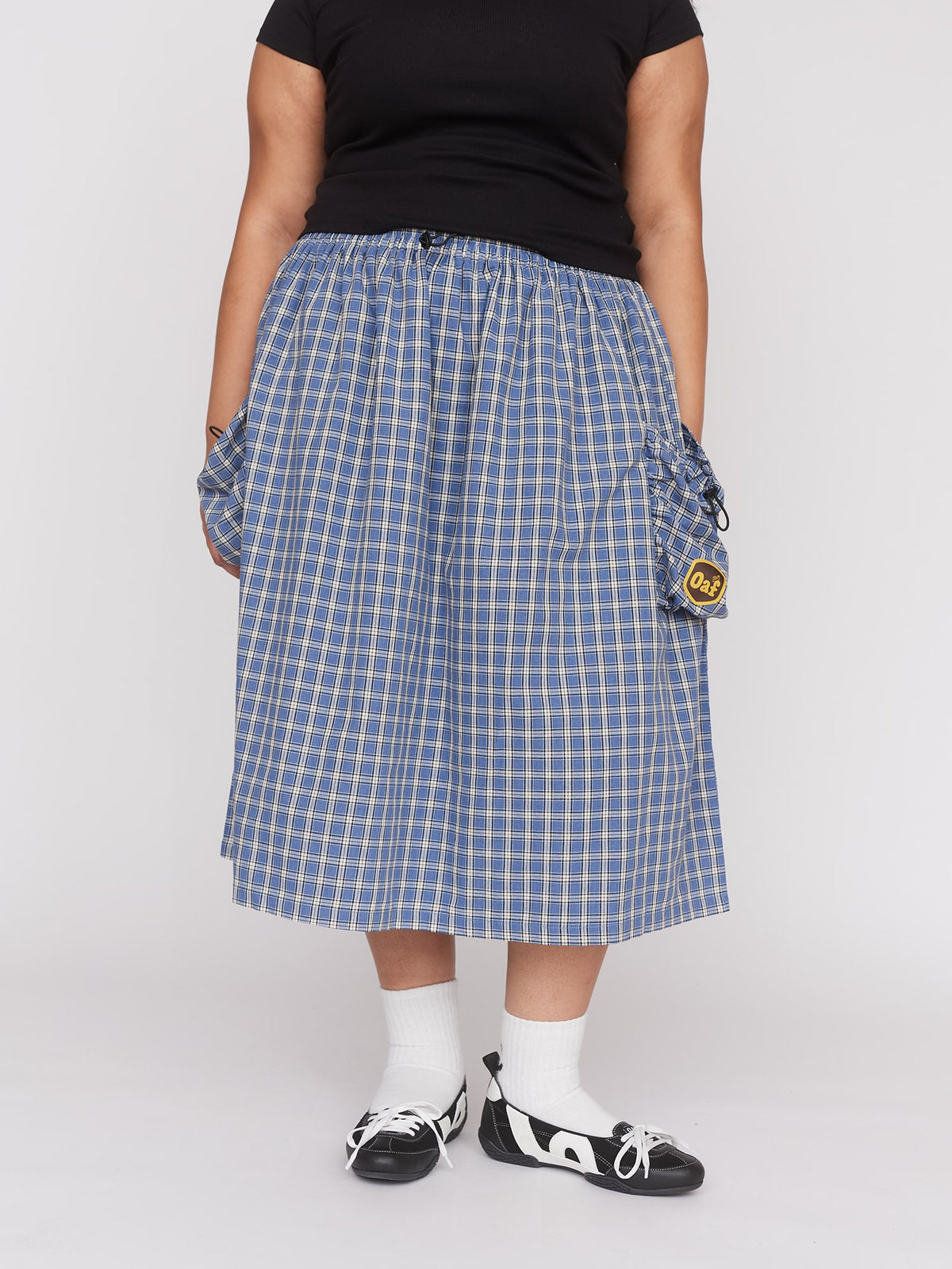 model:Zaynab wears size XXL and is 5’8”, collection-all-skirts