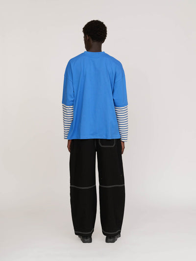 model:Elhadj wears size L and is 6’1”